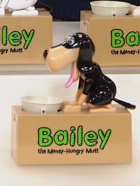 Bailey the Money-Hungry Mutt Black Dog Coin Bank. New In Sealed Box.